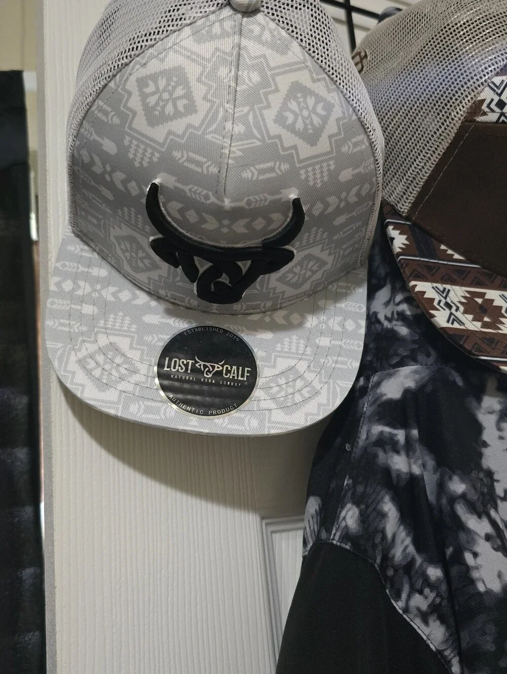 2 Kids Lost Calf Brown Aztec Trucker Hats from BUCKLE $45 For Both